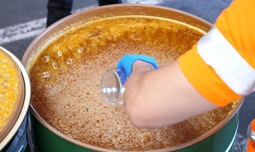 Investigators taking samples of honey